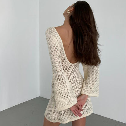 NZ-C00321003 2025 new beach skirt women's solid color sexy knitted hollow bikini swimsuit blouse sunscreen clothing